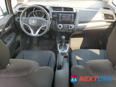 Zdjęcie 8 z 12 samochodu: 2019 HONDA FIT LX VIN:3HGGK5H48KM731029 - miniatura