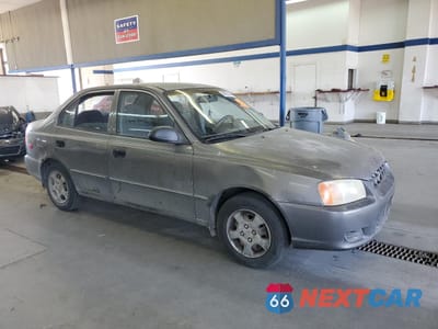 Czwarte zdjęcie samochodu z boku: 2001 HYUNDAI ACCENT GL VIN:KMHCG45C81U225775 - miniatura