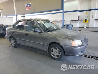 Czwarte zdjęcie samochodu z boku: 2001 HYUNDAI ACCENT GL VIN:KMHCG45C81U225775 - miniatura