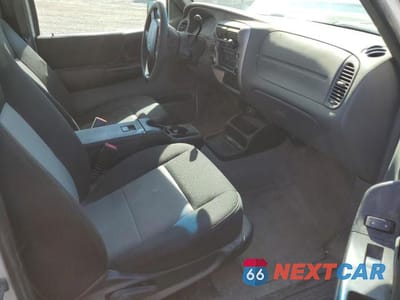 Zdjęcie 7 z 12 samochodu: 2011 FORD RANGER SUPER CAB VIN:1FTLR4FEXBPA40562 - miniatura