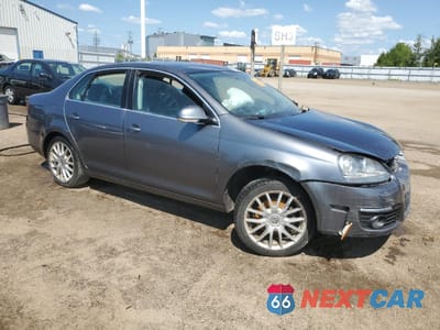 Czwarte zdjęcie samochodu z boku: 2009 VOLKSWAGEN JETTA S VIN:3VWJM81K09M041923 - miniatura