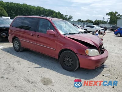 Czwarte zdjęcie samochodu z boku: 2005 KIA SEDONA EX VIN:KNDUP132256662909 - miniatura