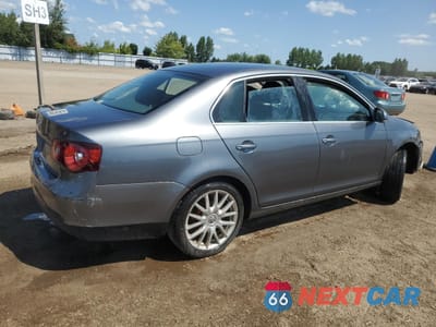 Trzecie zdjęcie samochodu z tyłu: 2009 VOLKSWAGEN JETTA S VIN:3VWJM81K09M041923 - miniatura