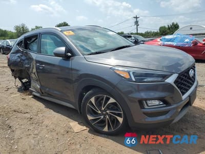 Czwarte zdjęcie samochodu z boku: 2020 HYUNDAI TUCSON LIMITED VIN:KM8J3CALXLU194292 - miniatura