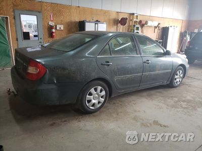Trzecie zdjęcie samochodu z tyłu: 2002 TOYOTA CAMRY LE VIN:4T1BE32KX2U541865 - miniatura