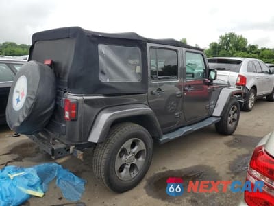 Trzecie zdjęcie samochodu z tyłu: 2017 JEEP WRANGLER UNLIMITED SAHARA VIN:1C4BJWEG8HL705072 - miniatura