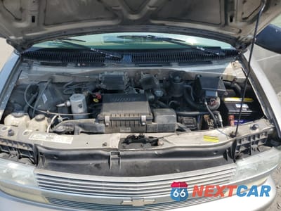Zdjęcie 12 z 14 samochodu: 2003 CHEVROLET ASTRO VIN:1GNEL19X43B137316 - miniatura
