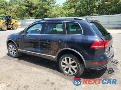 Trzecie zdjęcie samochodu z tyłu: 2014 VOLKSWAGEN TOUAREG V6 TDI VIN:WVGEP9BP4ED010414 - miniatura