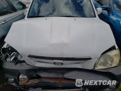 Zdjęcie 12 z 12 samochodu: 2005 MAZDA TRIBUTE S VIN:4F2YZ04145KM40360 - miniatura