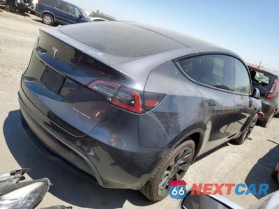 Trzecie zdjęcie samochodu z tyłu: 2022 TESLA MODEL Y VIN:7SAYGDEE2NF387253 - miniatura
