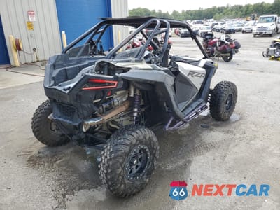 Czwarte zdjęcie samochodu z boku: 2021 POLARIS RZR PRO XP SPORT ROCKFORD FOSGATE LE VIN:3NSRAF923MG615220 - miniatura