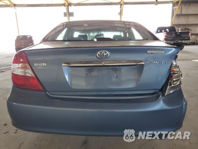 Zdjęcie 6 z 14 samochodu: 2003 TOYOTA CAMRY LE VIN:4T1BE32K93U682265 - miniatura