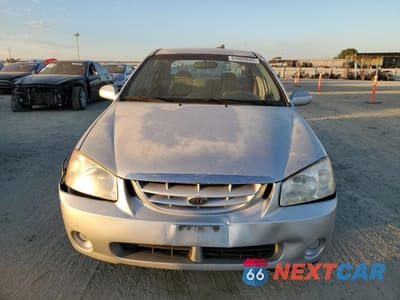 Piąte zdjęcie samochodu w środku: 2006 KIA SPECTRA LX VIN:KNAFE122365310796 - miniatura