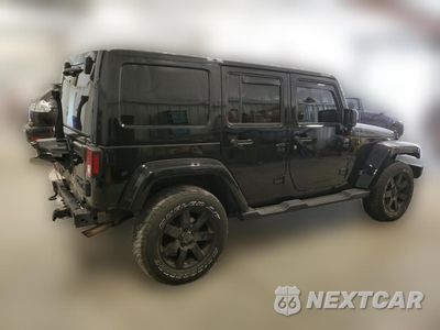Trzecie zdjęcie samochodu z tyłu: 2014 JEEP WRANGLER UNLIMITED SAHARA VIN:1C4BJWEG7EL283565 - miniatura