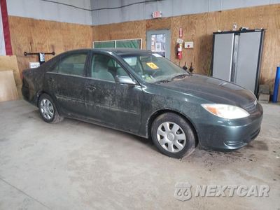 Czwarte zdjęcie samochodu z boku: 2002 TOYOTA CAMRY VIN:4T1BE32KX2U541865 - miniatura