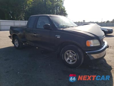 Czwarte zdjęcie samochodu z boku: 1998 FORD F150 VIN:2FTZX076XWCA41959 - miniatura
