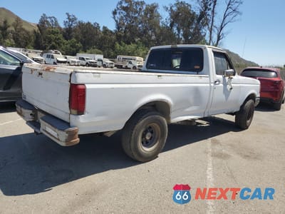 Trzecie zdjęcie samochodu z tyłu: 1987 FORD F150 VIN:1FTCF15N4HPB11000 - miniatura