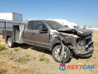 Czwarte zdjęcie samochodu z boku: 2021 FORD F550 SUPER DUTY VIN:1FD0X5HT3MED72119 - miniatura