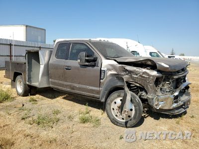 Czwarte zdjęcie samochodu z boku: 2021 FORD F550 SUPER DUTY VIN:1FD0X5HT3MED72119 - miniatura