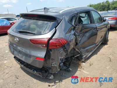Trzecie zdjęcie samochodu z tyłu: 2020 HYUNDAI TUCSON LIMITED VIN:KM8J3CALXLU194292 - miniatura