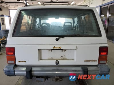 Zdjęcie 6 z 12 samochodu: 1990 JEEP CHEROKEE LAREDO VIN:1J4FJ57L1LL166898 - miniatura