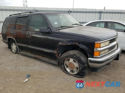 Czwarte zdjęcie samochodu z boku: 1996 CHEVROLET TAHOE K1500 VIN:1GNEK13R5TJ325376 - miniatura