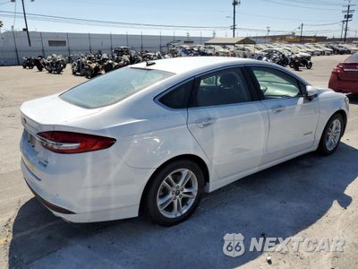 Trzecie zdjęcie samochodu z tyłu: 2018 FORD FUSION SE HYBRID VIN:3FA6P0LU9JR171714 - miniatura