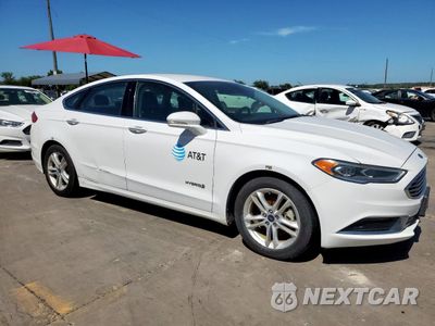 Czwarte zdjęcie samochodu z boku: 2018 FORD FUSION SE HYBRID VIN:3FA6P0LU1JR171657 - miniatura