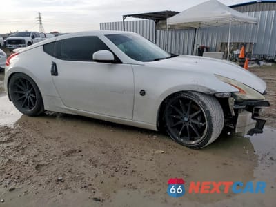 Czwarte zdjęcie samochodu z boku: 2009 NISSAN 370Z VIN:JN1AZ44E19M410242 - miniatura