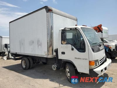 Czwarte zdjęcie samochodu z boku: 1997 ISUZU NPR VIN:4KLB4B1R9VJ002207 - miniatura
