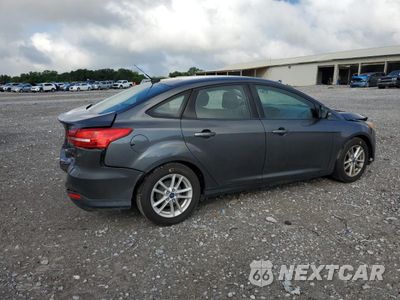 Trzecie zdjęcie samochodu z tyłu: 2016 FORD FOCUS SE VIN:1FADP3F21GL357046 - miniatura