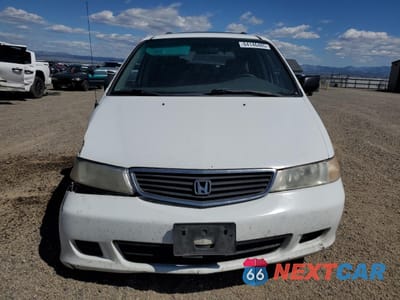 Piąte zdjęcie samochodu w środku: 2001 HONDA ODYSSEY LX VIN:2HKRL18561H529123 - miniatura