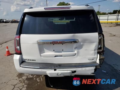 Zdjęcie 6 z 14 samochodu: 2016 GMC YUKON DENALI VIN:1GKS2CKJ1GR379174 - miniatura