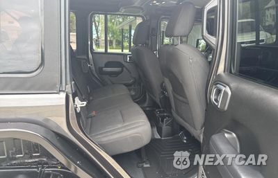 Zdjęcie 6 z 12 samochodu: 2022 JEEP WRANGLER UNLIMITED SPORT VIN:1C4HJXDM3NW144667 - miniatura