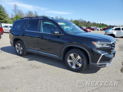 Czwarte zdjęcie samochodu z boku: 2023 HONDA PILOT EXL VIN:5FNYG1H5XPB039680 - miniatura