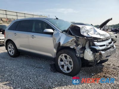 Czwarte zdjęcie samochodu z boku: 2011 FORD EDGE SEL VIN:2FMDK3JC2BBB02886 - miniatura