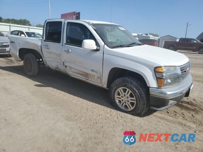 Czwarte zdjęcie samochodu z boku: 2012 GMC CANYON SLE VIN:1GTH6MFE6C8132164 - miniatura