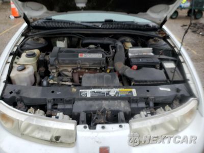 Zdjęcie 11 z 14 samochodu: 2000 SATURN SC2 VIN:1G8ZY1277YZ148504 - miniatura