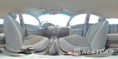 Zdjęcie 14 z 14 samochodu: 2004 FORD FOCUS LX VIN:1FAFP33P84W191529 - miniatura