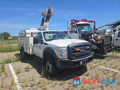 Czwarte zdjęcie samochodu z boku: 2015 FORD F450 SUPER DUTY VIN:1FDUF4GY3FED21105 - miniatura