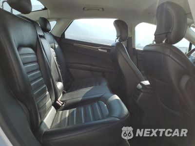 Zdjęcie 10 z 12 samochodu: 2014 FORD FUSION SE PHEV VIN:3FA6P0PU7ER397718 - miniatura