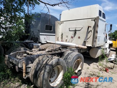 Czwarte zdjęcie samochodu z boku: 1999 INTERNATIONAL 9400 SEMI TRUCK VIN:2HSFHAERXXC087707 - miniatura