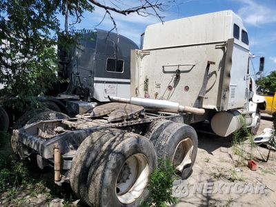 Czwarte zdjęcie samochodu z boku: 1999 INTERNATIONAL 9400 SEMI TRUCK VIN:2HSFHAERXXC087707 - miniatura