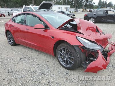 Czwarte zdjęcie samochodu z boku: 2023 TESLA MODEL 3 VIN:5YJ3E1EA6PF592635 - miniatura