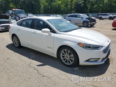 Czwarte zdjęcie samochodu z boku: 2017 FORD FUSION SE HYBRID VIN:3FA6P0LUXHR409421 - miniatura