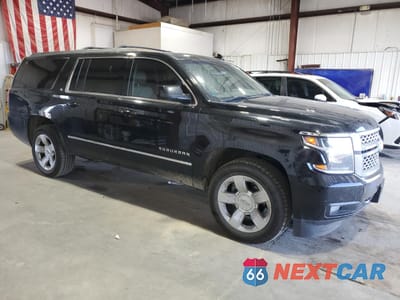 Czwarte zdjęcie samochodu z boku: 2017 CHEVROLET SUBURBAN K1500 LT VIN:1GNSKHKC6HR242220 - miniatura
