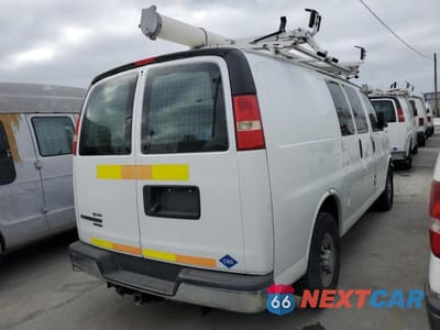 Trzecie zdjęcie samochodu z tyłu: 2014 CHEV EXPRESS G2500 VIN:1GCWGFCB1E1133843 - miniatura