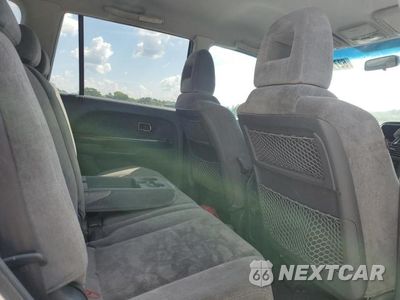 Zdjęcie 11 z 13 samochodu: 2004 HONDA PILOT EX VIN:2HKYF18434H541437 - miniatura