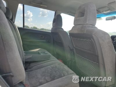 Zdjęcie 11 z 13 samochodu: 2004 HONDA PILOT EX VIN:2HKYF18434H541437 - miniatura