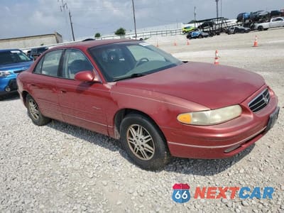 Czwarte zdjęcie samochodu z boku: 1999 BUICK REGAL LS VIN:2G4WB52K5X1589220 - miniatura